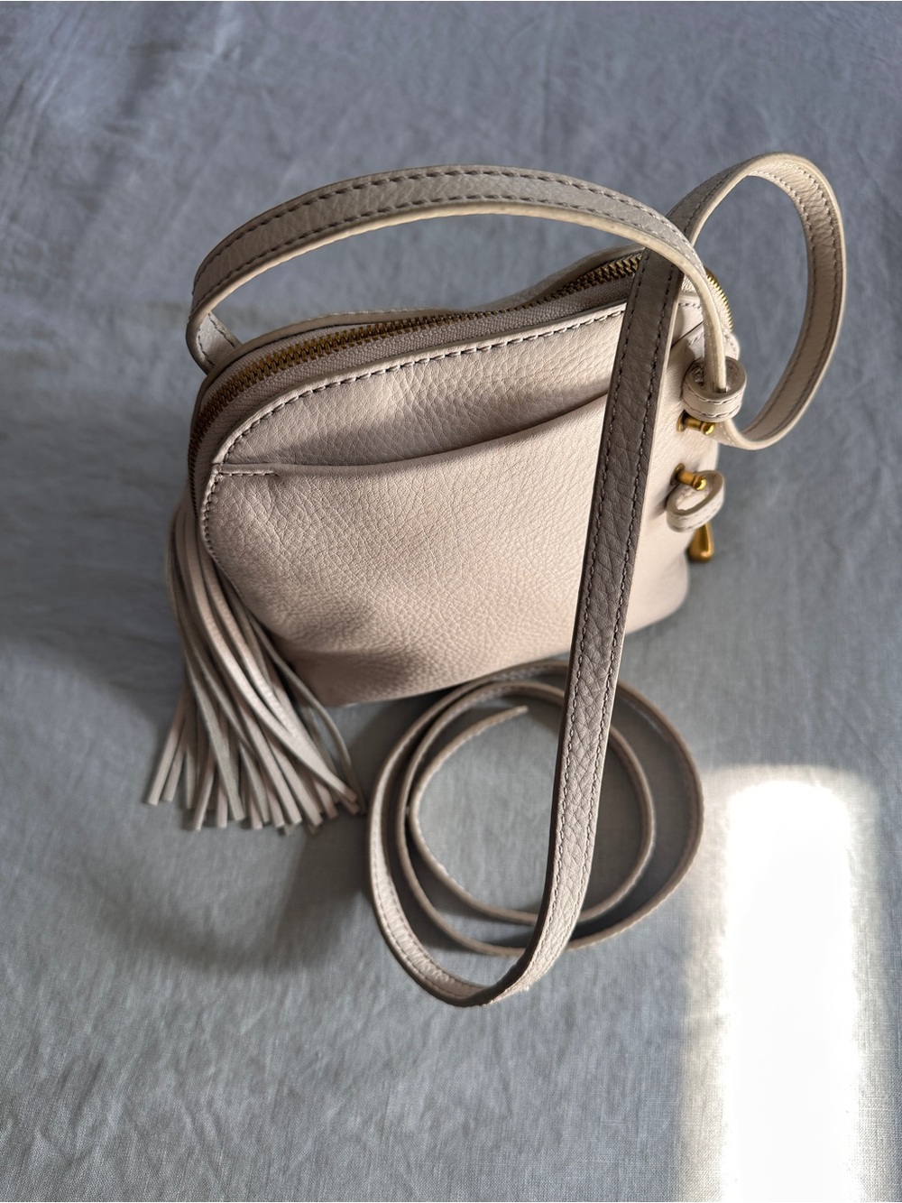 HOBO Ivory Nash Crossbody Bag | Pebbled Leather Tassel Gold Hardware - Picture 4 of 16